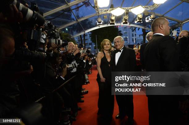 Ex-IMF chief Dominique Strauss-Kahn and Media Marketing Executive Myriam L'Aouffir arrive on May 25, 2013 for the screening of the film "Only Lovers...