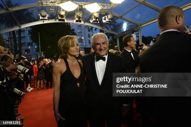 Ex-IMF chief Dominique Strauss-Kahn and Media Marketing Executive Myriam L'Aouffir arrive on May 25, 2013 for the screening of the film "Only Lovers...