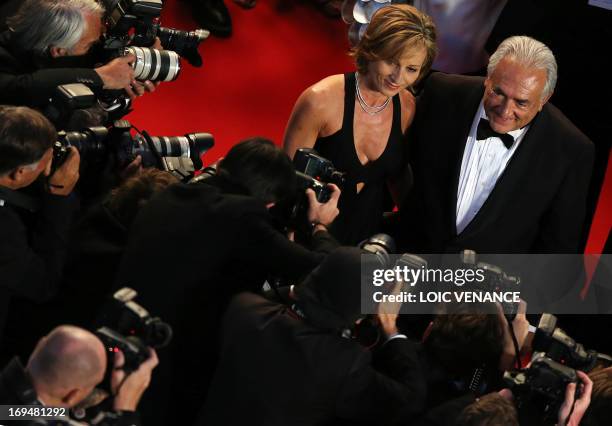Ex-IMF chief Dominique Strauss-Kahn and Media Marketing Executive Myriam L'Aouffir arrive on May 25, 2013 for the screening of the film "Only Lovers...