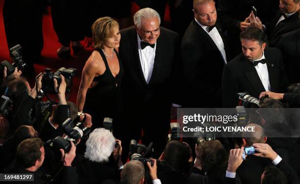 Ex-IMF chief Dominique Strauss-Kahn and Media Marketing Executive Myriam L'Aouffir arrive on May 25, 2013 for the screening of the film "Only Lovers...