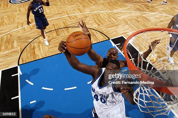 Shawn Kemp of the Orlando Magic grabs the rebound during the NBA game against the Washington Wizards at TD Waterhouse Centre on December 6, 2002 in...
