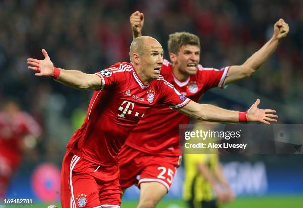 Arjen Robben of FC Bayern Muenchen celebrates after scoring the winning goal during the UEFA Champions League final match between Borussia Dortmund...
