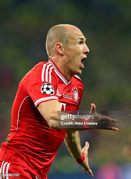 Arjen Robben of FC Bayern Muenchen celebrates after scoring the winning goal during the UEFA Champions League final match between Borussia Dortmund...