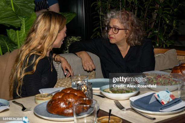 Keren Margolis and Jenji Kohan attend a private reception for Rosh Hashana at Mike Solomonov's K'far on September 21, 2023 in the Brooklyn Borough of...