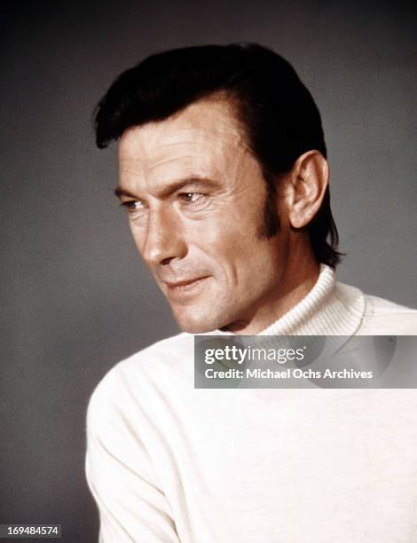 Actor Laurence Harvey poses for a portrait in circa 1970.