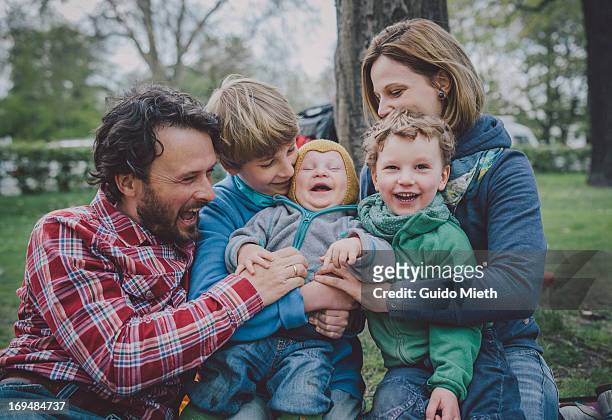 happy family in park. - five people stock pictures, royalty-free photos & images