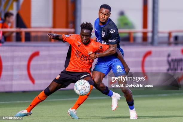 Garang Kuol of FC Volendam and Navajo Bakboord of Heracles Almelo battle for the ball during the Dutch Eredivisie match between FC Volendam and...