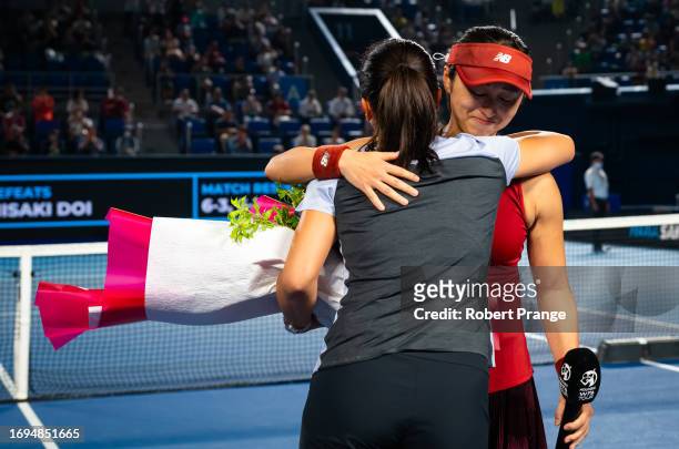 Misaki Doi of Japan hugs Kurumi Nara of Japan after playing her last career match on Day 4 of the Toray Pan Pacific Open at Ariake Coliseum on...
