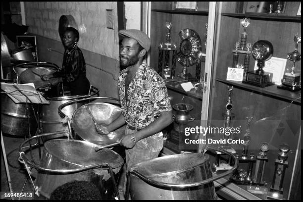Exodus Steel Band playing their pan drums at their rehearsal rooms in Port Of Spain, Trinidad, June 1990.
