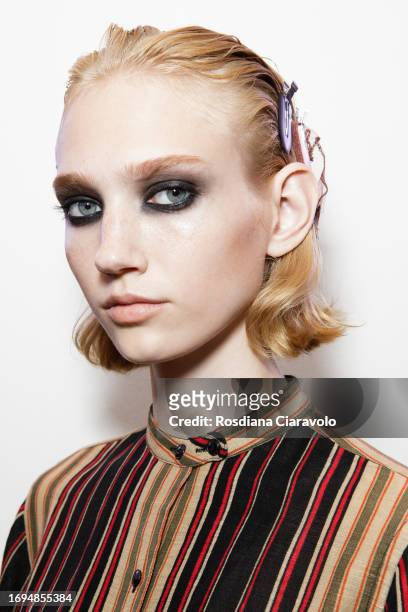 Model Tess Breeden backstage ahead of the Tom Ford fashion show during the Milan Fashion Week Womenswear Spring/Summer 2024 on September 21, 2023 in...