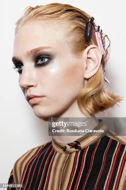 Model Tess Breeden backstage ahead of the Tom Ford fashion show during the Milan Fashion Week Womenswear Spring/Summer 2024 on September 21, 2023 in...