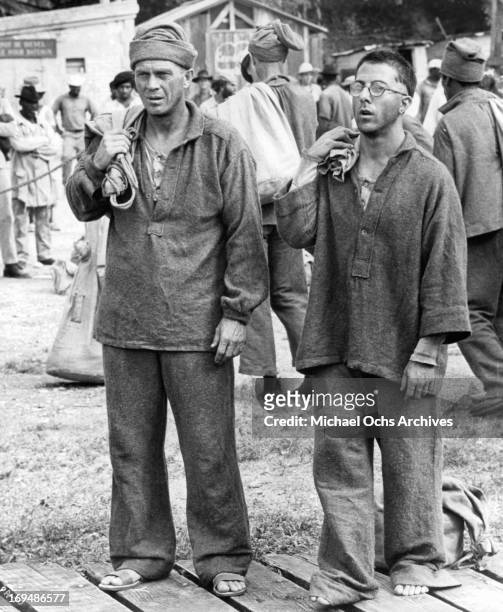 Steve McQueen and Dustin Hoffman are fellow convicts imprisoned at French Guiana in a scene from the film 'Papillon', 1973.