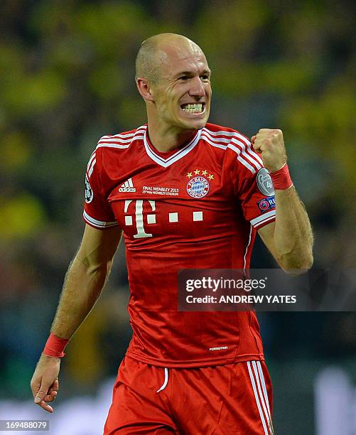 Bayern Munich's Dutch midfielder Arjen Robben celebrates at the final whistle after scoring the winning goal during the UEFA Champions League final...