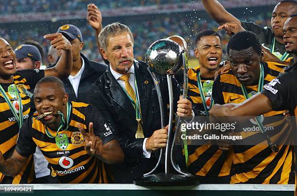 Head coach Stuart Baxter of the Chiefs celebrates with throphy and his players after the Nedbank Cup Final between SuperSport United and Kaizer...