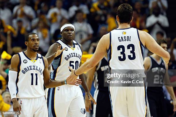 Mike Conley, Zach Randolph and Marc Gasol of the Memphis Grizzlies celebrate in the first quarter while taking on the San Antonio Spurs during Game...