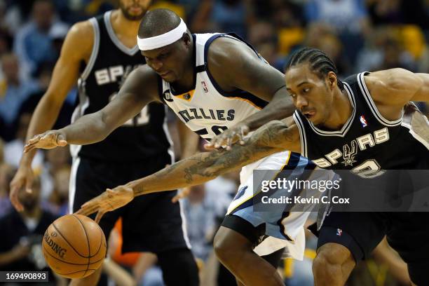Zach Randolph of the Memphis Grizzlies and Kawhi Leonard of the San Antonio Spurs go after a loose ball in the first half during Game Three of the...