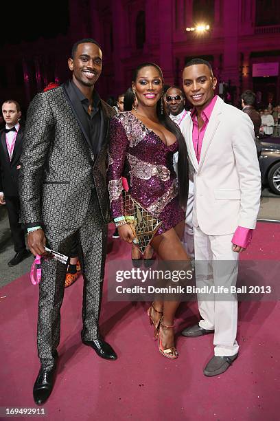 Guests, dressed with fancy costumes attend the 'Life Ball 2013 - Magenta Carpet Arrivals' at City Hall on May 25, 2013 in Vienna, Austria.