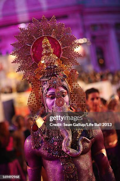 Guests, dressed with fancy costumes attend the 'Life Ball 2013 - Magenta Carpet Arrivals' at City Hall on May 25, 2013 in Vienna, Austria.