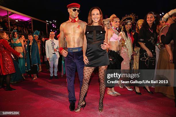 Sonja Kirchberger and guest attend the 'Life Ball 2013 - Magenta Carpet Arrivals' at City Hall on May 25, 2013 in Vienna, Austria.