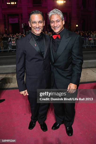 Greg Louganis and John Chaillot attend the 'Life Ball 2013 - Magenta Carpet Arrivals' at City Hall on May 25, 2013 in Vienna, Austria.