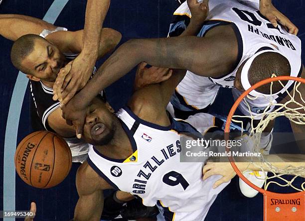 Tony Allen of the Memphis Grizzlies is hit in the face by teammate Zach Randolph against Tony Parker of the San Antonio Spurs during Game Three of...