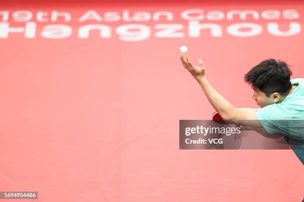 Liang Jingkun of China competes against Doan Ba Tuan Anh of Vietnam in the Table Tennis - Men's Team Preliminary Group A match between China and...