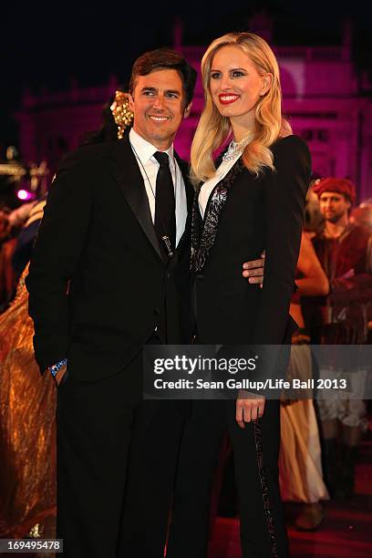 Karolina Kurkova and Archie Drury attend the 'Life Ball 2013 - Magenta Carpet Arrivals' at City Hall on May 25, 2013 in Vienna, Austria.