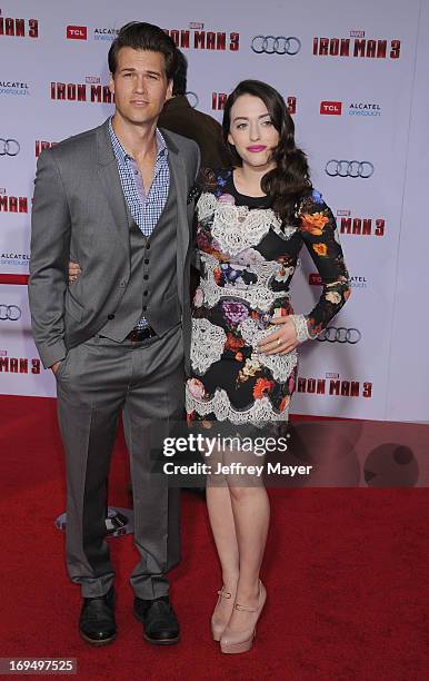 Actress Kat Dennings and actor Nick Zano arrive at the Los Angeles Premiere of "Iron Man 3" at the El Capitan Theatre on April 24, 2013 in Hollywood,...