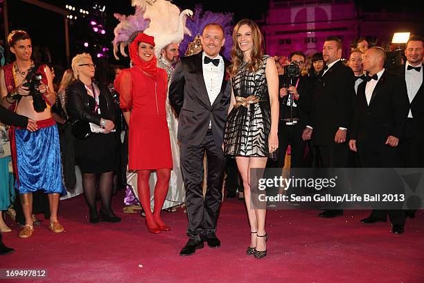 Gery Keszler and Hilary Swank attend the 'Life Ball 2013 - Magenta Carpet Arrivals' at City Hall on May 25, 2013 in Vienna, Austria.