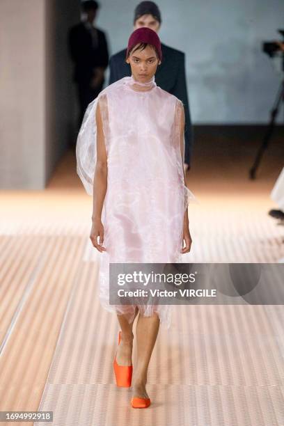 Model walks the runway during the Prada Ready to Wear Spring/Summer 2024 fashion show as part of the Milan Fashion Week on September 21, 2023 in...