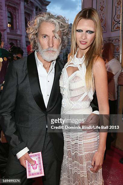 Aiden Shaw and model attend the 'Life Ball 2013 - Magenta Carpet Arrivals' at City Hall on May 25, 2013 in Vienna, Austria.