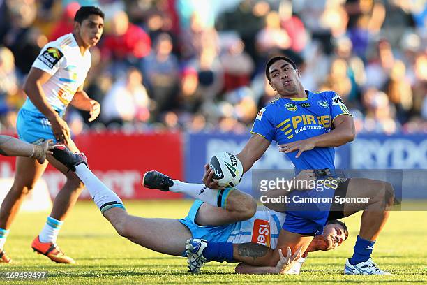 Ken Sio of the Eels is tackled during the round 11 NRL match between the Parramatta Eels and the Gold Coast Titans at Glen Willow Regional Sports...