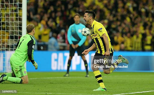 Ilkay Guendogan of Borussia Dortmund celebrates after scoring a goal from the penalty spot during the UEFA Champions League final match between...