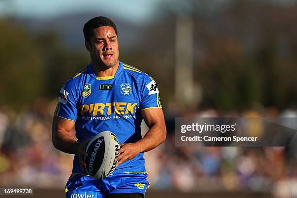 Jarryd Hayne of the Eels runs the ball during the round 11 NRL match between the Parramatta Eels and the Gold Coast Titans at Glen Willow Regional...