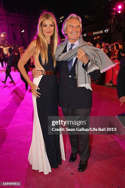 Model Tereza Maxova and jazz guitarist John McLaughlin arrive on the Magenta Carpet at the 2013 Life Ball at City Hall on May 25, 2013 in Vienna,...