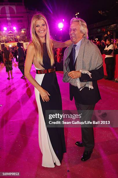 Model Tereza Maxova and jazz guitarist John McLaughlin arrive on the Magenta Carpet at the 2013 Life Ball at City Hall on May 25, 2013 in Vienna,...