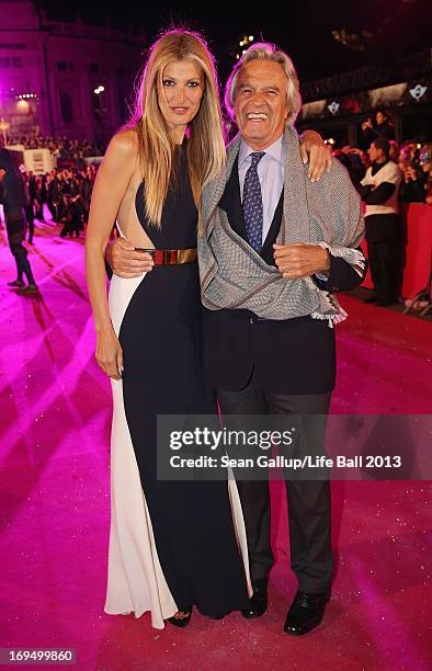 Model Tereza Maxova and jazz guitarist John McLaughlin arrive on the Magenta Carpet at the 2013 Life Ball at City Hall on May 25, 2013 in Vienna,...