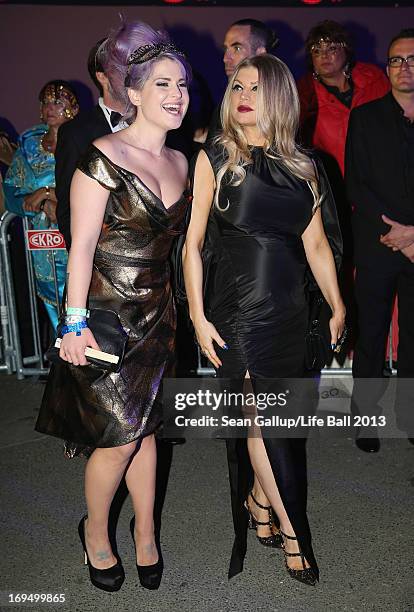 Kelly Osbourne and Fergie of the Black Eyed Peas arrive at the 2013 Life Ball at City Hall on May 25, 2013 in Vienna, Austria.