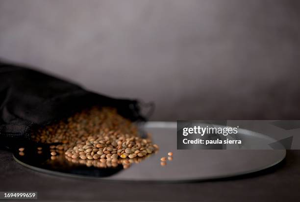 lentils reflected on a mirror - lentil stock pictures, royalty-free photos & images