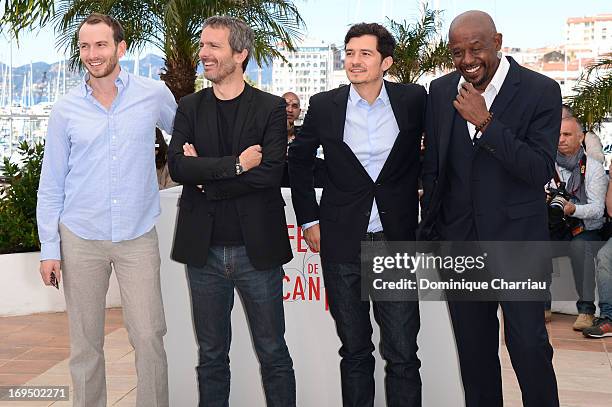 Actor Conrad Kemp, director Jerome Salle, actors Orlando Bloom and Forest Whitaker attend the photocall for 'Zulu' during the 66th Annual Cannes Film...