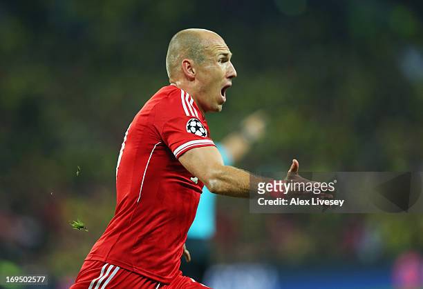 Arjen Robben of Bayern Muenchen celebrates as he scores their second goal during the UEFA Champions League final match between Borussia Dortmund and...
