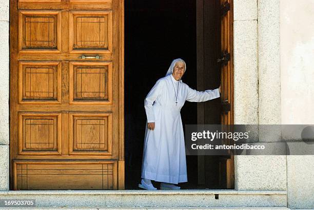 Nun close the door of the church