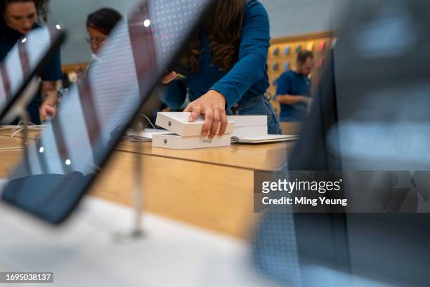 Customer purchases the new iPhone 15 in store on September 22, 2023 in Milan, Italy. After Apple's announcement of the iPhone 15 series on September...