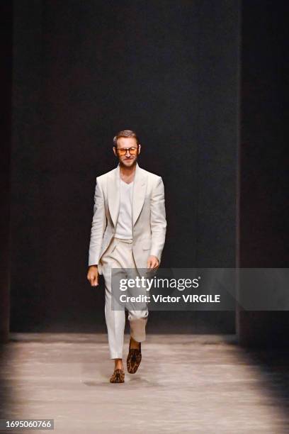 Fashion designer Peter Hawkings walks the runway during the Tom Ford Ready to Wear Spring/Summer 2024 fashion show as part of the Milan Fashion Week...