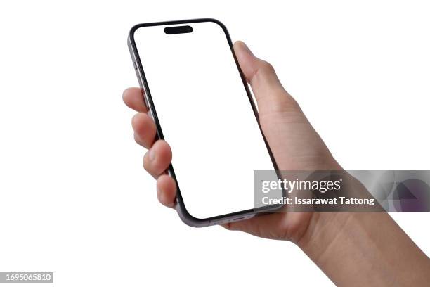 hand holding new smartphone on white background - brand name smart phone stock-fotos und bilder