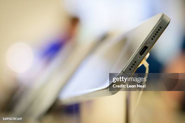 Port is seen on a display model as customers purchase iPhone 15 handsets at the Apple Store on September 22, 2023 in London, England. After Apple's...