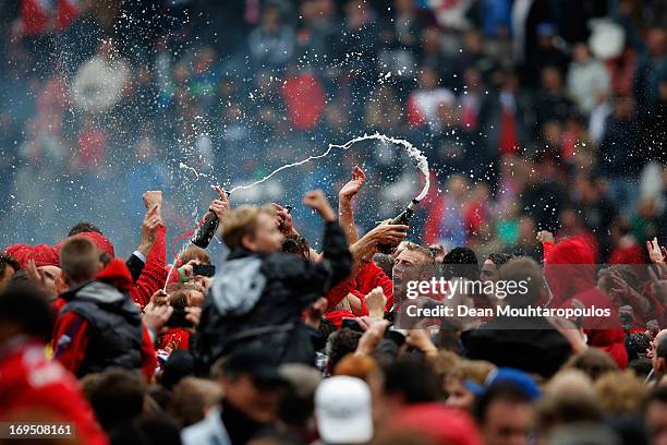 The3 players from Utrecht celebrate with the fans after winning the Eredivisie Europa League Play off match between FC Utrecht and FC Twente at...