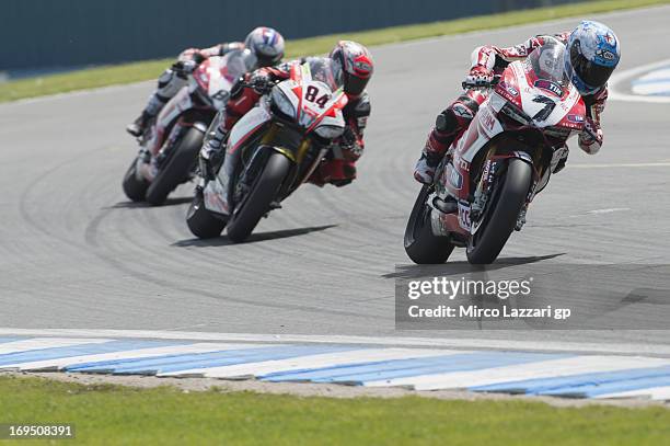 Carlos Checa of Spain and Team Ducati Alstare leads the field in Race 1 of the World Superbikes during round five of 2013 Superbikes FIM World...