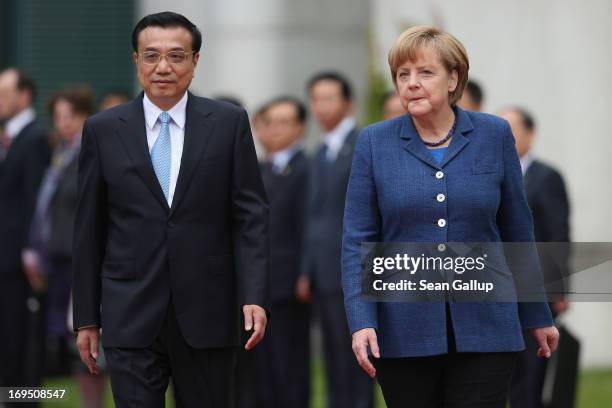 German Chancellor Angela Merkel welcomes Chinese Prime Minister Li Keqiang upon his arrival at the Chancellery on May 26, 2013 in Berlin, Germany. On...