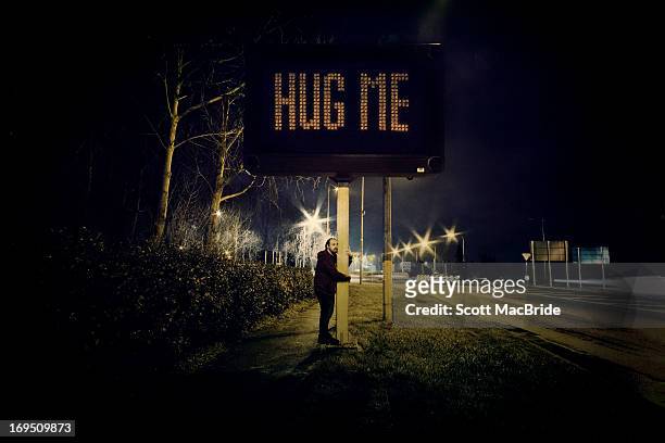 hug me - scott macbride stock pictures, royalty-free photos & images